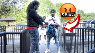 Reaching In My Bag Prank Infront Of Gangsters In HOOD GONE WRONG !