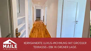 Kernsanierte Luxus-Wohnung mit großer Terrasse+ EBK in grüner Lage.