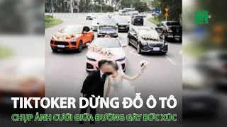 Tiktoker dừng đỗ ô tô, chụp ảnh cưới giữa đường gây bức xúc | VTC14