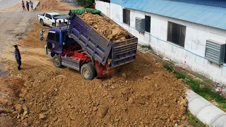 Small Bulldozer Working Pushing Dirt And Rock - Mini Dump Truck Unloading Gravel And Dirt