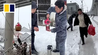 Chinese villagers send free supplies to motorists stranded on highway