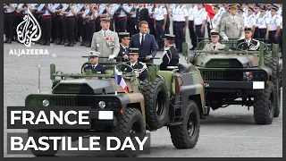 France marks Bastille Day with scaled-down military parade