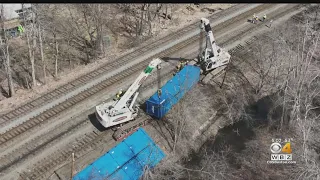 Ayer train derailment cleanup draws interest and concern from neighbors