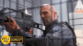 Bullet shoots Mason Hargreaves with a machine gun / Jason Statham in the movie Wrath of Man