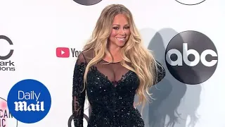 Mariah Carey wows putting on a busty display  after the AMAs