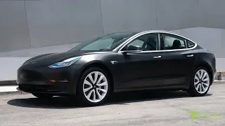 Black Tesla Model 3 Customized with Satin Black Wrap and Digital License Plate