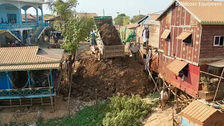 Video of filling the land with 6x19 mater land next to the Road By The river Bulldozer Pushing Soil