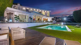 $13,795,000! Ultra-modern estate in Beverly Hills with breathtaking city to ocean views