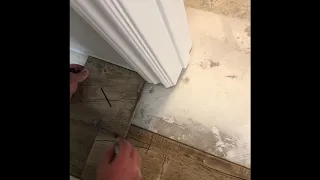 Hack on how to Trace perfect rips under door jams every time and why we start laminate in hallways