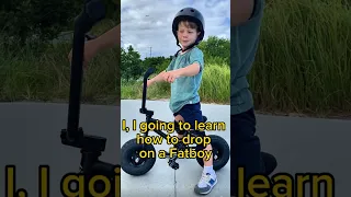 Toddler learns to drop in on Fatboy mini BMX