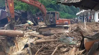 At least 22 people killed by floods and landslides in Indonesia