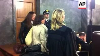 Moroccan woman at centre of Berlusconi trial arrives in court to testify as a witness