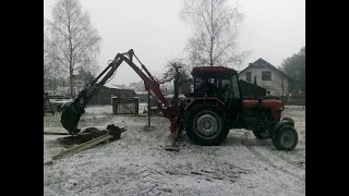 Wyrywanie słupków od płotu Ursusem c 330 i Trollem