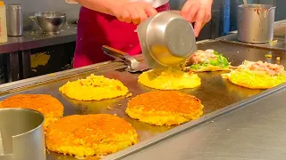 japanese street food - egg bacon, okonomiyaki, yakisoba (dotombori osaka)