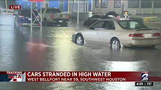 Cars stranded in high water in SW Houston