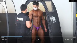 Bodybuilder backstage tanning, Cheng Neng
