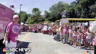 Elementary school students and staff surprise assistant principal battling cancer