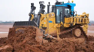 New Cat D9 Dozer Pushing Scrapers