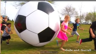 Giant Inflatable Soccer Ball!  6 Feet TALL! | Gabe and Garrett