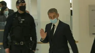 Former France president Sarkozy arrives in court for corruption trial | AFP