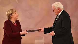 Bundespräsident Steinmeier entlässt Merkel aus dem Amt | AFP