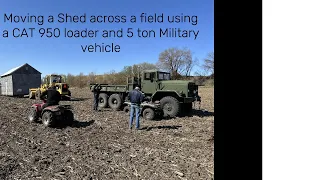 Moving a shed with a CAT 950 Loader &  Ton Military Vehicle