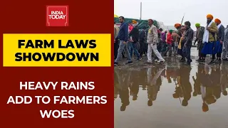 Farm Laws Showdown: Farmers Continue Protest Amid Heavy Rains At Delhi Borders