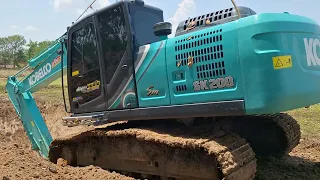 ขุดคลองไส้ไก่แบบติดปีก kobelco sk200-sm ชมไปบ่นไป excavator