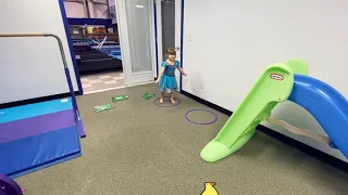 Toddler Gymnast on Bars