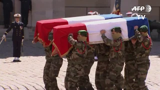 Soldats tombés au Burkina: arrivée des cercueils aux Invalides I AFP Images