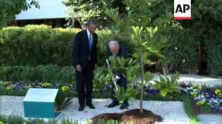 Obama visits Peres, comments from both, leaders plant magnolia tree