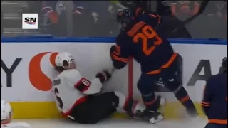 Leon Draisaitl lays a huge hit on Jakob Chychrun