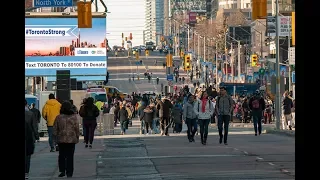 Vigil unites a city grieving victims of Toronto van attack