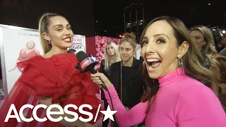 Miley Cyrus Stands In For Husband Liam Hemsworth At The 'Isn't It Romantic' Premiere! | Access