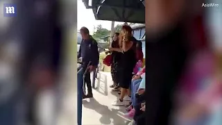 Shocking moment man slaps Muslim woman for not wearing a hijab