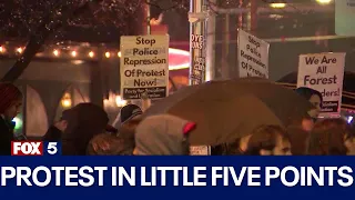 Rallies against Atlanta police training facility after protestor killed, Georgia state trooper shot