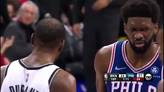 Embiid and Durant exchange words after a tough play