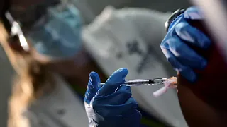 Questions over vaccine effectiveness as new strain emerges in the US