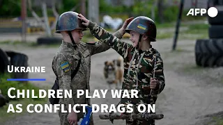 Children play war as Ukraine conflict drags on | AFP