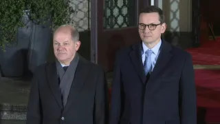 German Chancellor Olaf Scholz welcomed by Polish Prime Minister in Warsaw | AFP