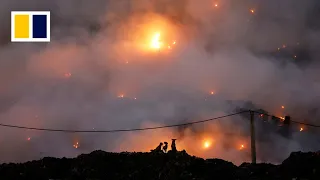 New Delhi’s largest landfill is on fire