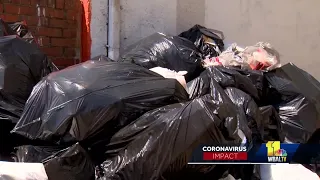 Workers out due to coronavirus leaves Baltimore DPW 'overwhelmed' as trash piles up