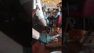 Nusret chopping meat in Dubai, salt bae king