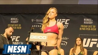 See Ronda Rousey's Wild Staredown With Lion-Masked Amanda Nunes