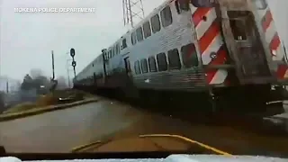 VIDEO: Police officer barely avoids being struck by Metra train in Mokena
