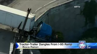 Tractor-Trailer dangles from I-95 ramp