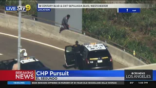 Pursuit suspect, CHP at standoff as man threatens to jump off freeway overpass