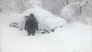 'This is ridiculous;' Mass. town buried under 27" of heavy, wet snow
