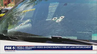 Video shows man shoot at deputy's vehicle