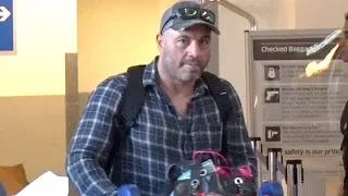 EXCLUSIVE - Joe Rogan Keeps It Together At LAX